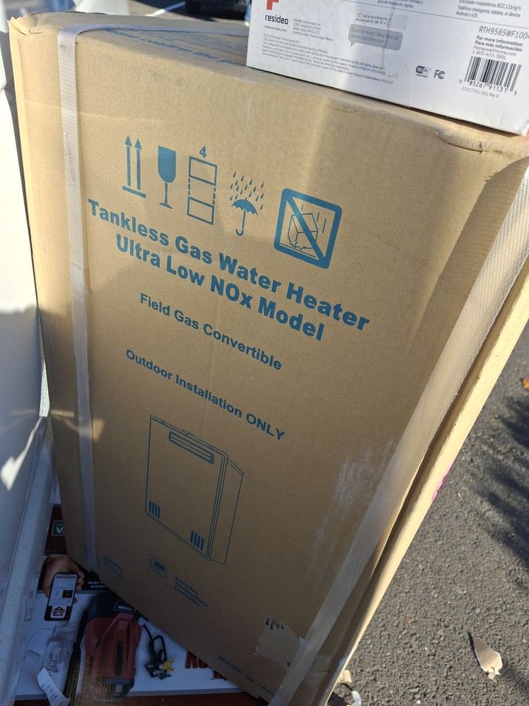 Gas Tankless Water Heater Paid 1600.00 Unopened Never Used Still Sealed