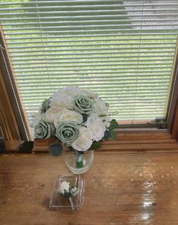 Sage green flower bouquet and boutonniere