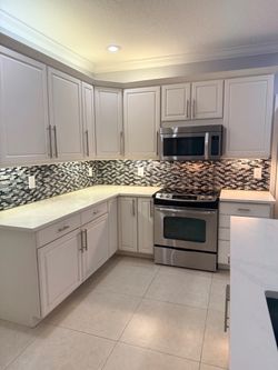 Dozens of Wood, KITCHEN CABINETS, Uppers & Countertop Cabinets. Selling as Bulk Lot First Come!