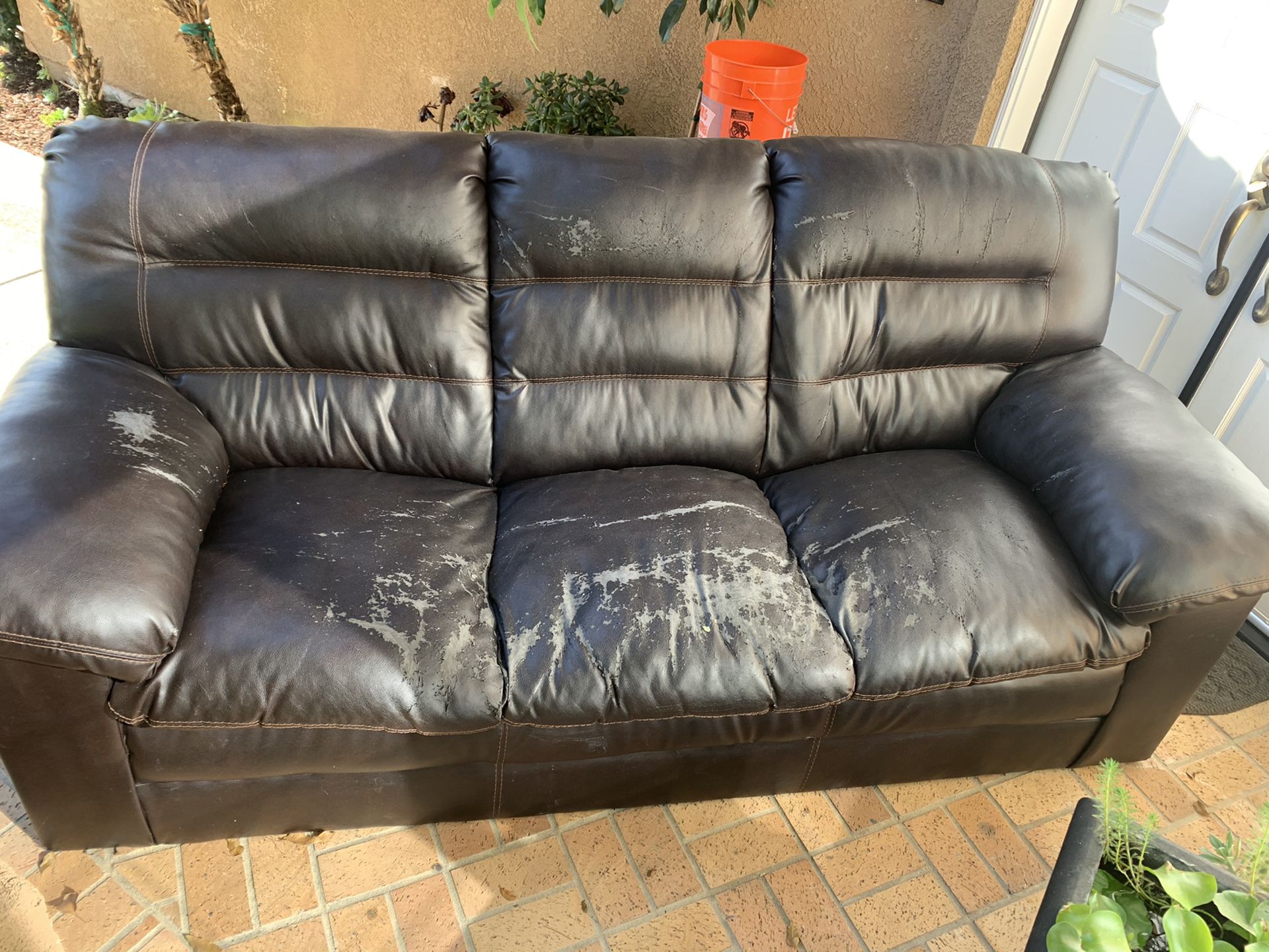 Free faux leather couch. Just needs slip cover.