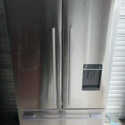 4 door refrigerator. 90 day guarantee. Free delivery Vancouver area.