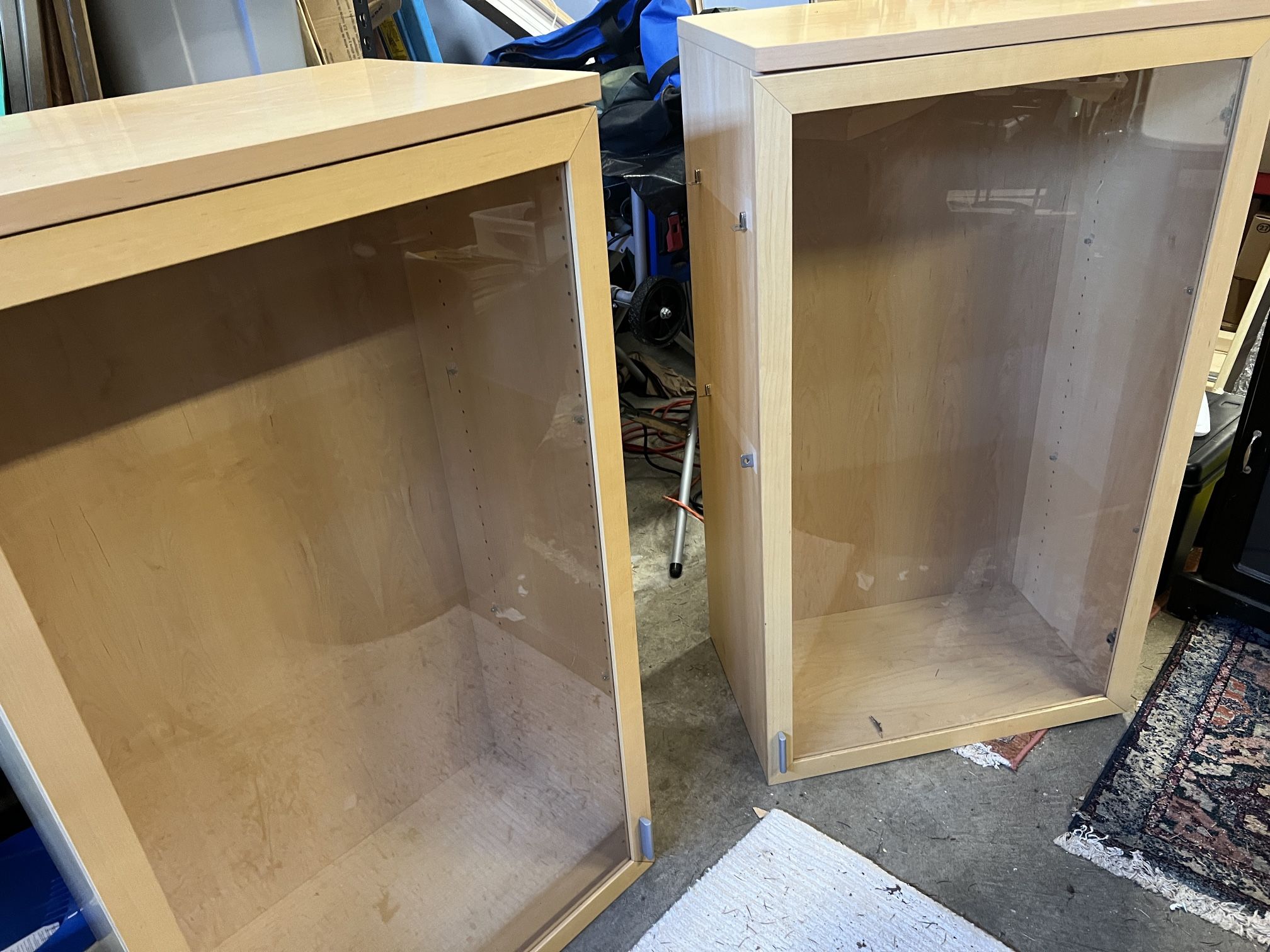 Pair Of Cabinets With Glass Doors And Light Plugins 