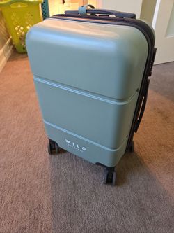 Hard shell, 8 wheel carry on bag