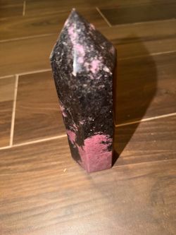 pink and black Rhodonite crystal tower