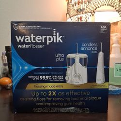 Waterpik Water Flosser Ultra Plus + Cordless Enhance 3000
