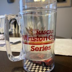 Plastic Mug With Car In The Bottom 