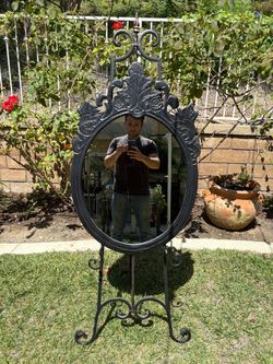 Ornate Black Oval Mirror