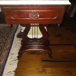 A vintage Sheraton Duncan Phyfe style side stand