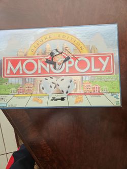Deluxe Edition Monopoly Game. New. Never Opened.