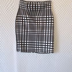 Knee-length skirt, black and white, stretch fabric. Size L. Price: $10.