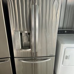 LG 33-wide refrigerator for sale with a 3-month warranty