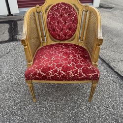 upholstered antique armchair in the Louis XVI style.  28” wide  26” deep  17” floor to seat  35” tall in back