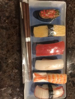 Sushi candles on tray