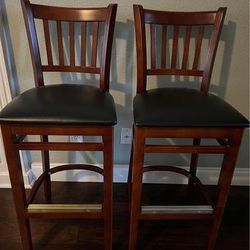 2wooden bar stools for $100 in mint condition