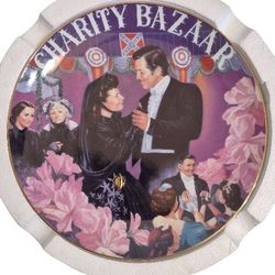 Celebrate the timeless romance of Gone With the Wind with this elegant musical collector plate, titled "The Charity Bazaar" from the Musical Treasure