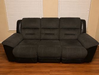 Couch and loveseat sectional with coffee table and two end tables