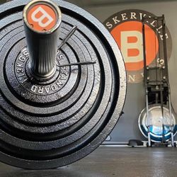 Olympic cast iron weight plate set 245 lbs plus 45 lb Bar Brand new still in the box!  7ft 45lb  barbell bar 2 x spring clip collars 12 plates 