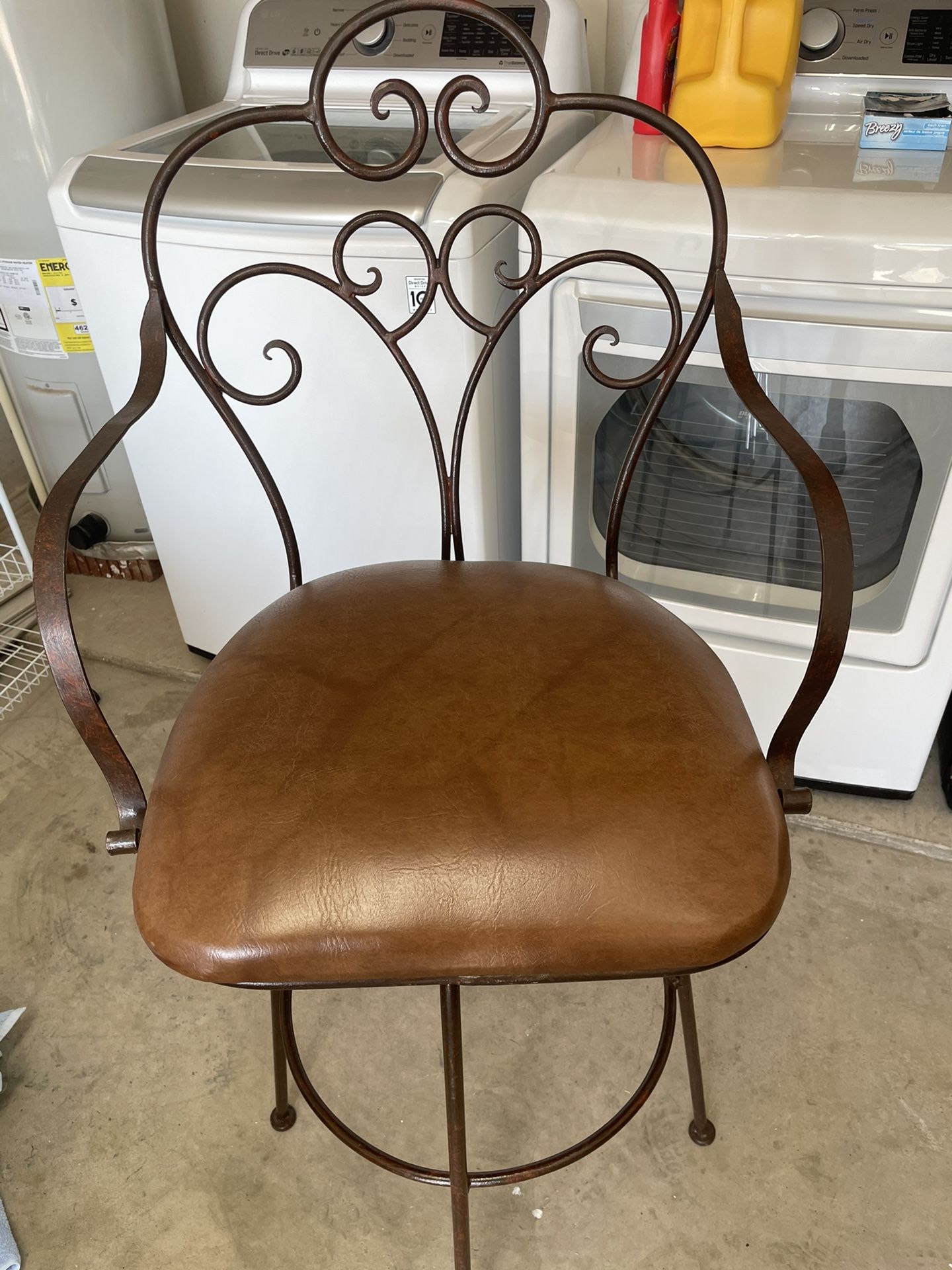 Wrought Iron “32 (Taller Sized) Bar stools with leather seats.