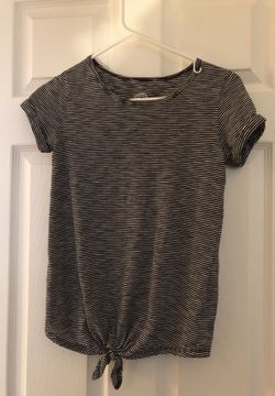 Striped short sleeve shirt. Girls size 14.