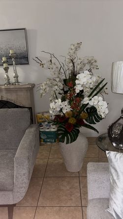 Vase with floral arrangement