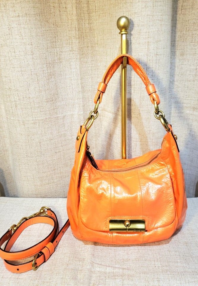 Orange Coach Patent Leather Hobo Bag