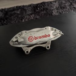 Three 4 piston Brembo Brake Calipers (2 Rear w/ Brake Lines & 1 Front Without Brake Line) 