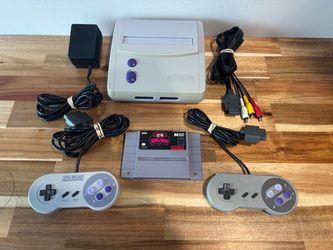 Super Nintendo Jr. (SNES Jr.) Videogame Console Bundle (2 Controllers, Joe & Mac Game, & Cords)