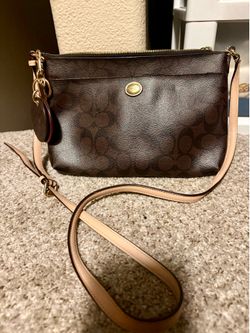 Authentic Coach purse with mirror charm