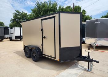 2026 New 6x12 TA Screwless Enclosed Trailer | Blackout | Spoiler Package | .08 Polycor | Dexter Axles | El Paso | 1127

(Tan)