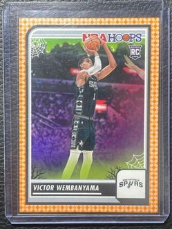 2023-24 NBA Hoops Victor Wembanyama Haunted Hoops Orange Parallel Rookie Card Spurs #108