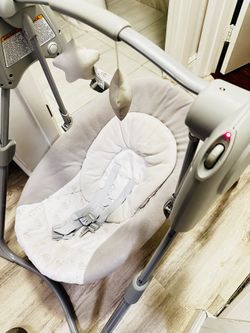 Graco Slim Spaces Compact Baby Swing, Space Saving Portable Bay Swing with Height Adjustable Legs