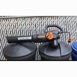 WORX LEAF BLOWER AND MULCHES LEAVES.
