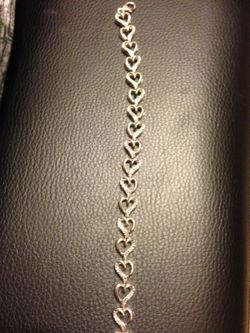 Diamond heart bracelet on sterling silver. Never used