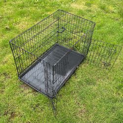 Medium Sized Dog Cage With Two Dog Bowls 
