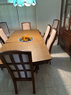 Dining room table with armoire