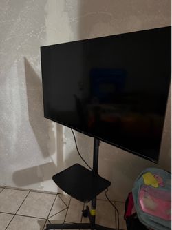 43 inch Roku Tv with new ($39.00 stand purchased May 2026)  $125 for both