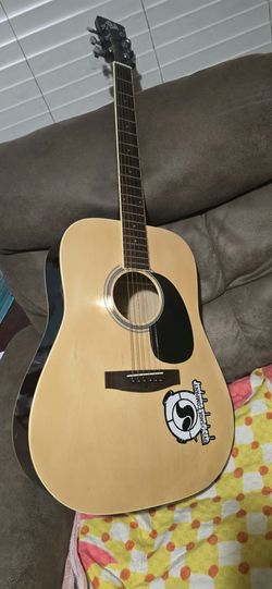 ACOUSTIC GUITAR $76