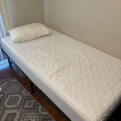 Memory foam twin bed mattress and frame nearly new
