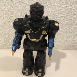 Vintage Collectible 9” Tall Action Blasting Robot, Moves Forward Lights With Sound 