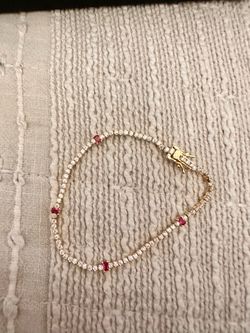 Gold layered Tennis Bracelet with Ruby and clear AAA cz