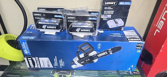 NEW HART 40V CHAINSAW WITH 5 BATTERIES AND 2 CHARGERS ONE IS A DOUBLE CHARGER 400$ FOR ALL RETAIL IS 850$:SONLESS THAN 1/2 FOR BRAND NEW!!!!