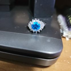 Size 7 Blue Topaz Ring Trimmed In tiny White Sapphire Sterling