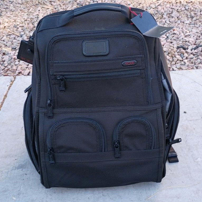 TUMI Alpha 3 Compact Laptop Brief Pack, a business backpack known for its durability and organization.