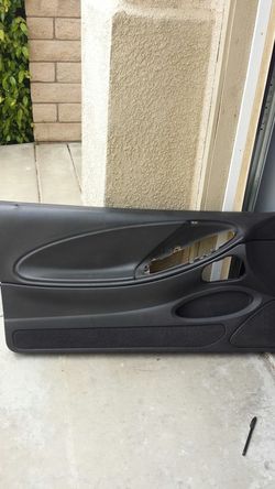 1999 to 1994 ford mustang driver side door panel.