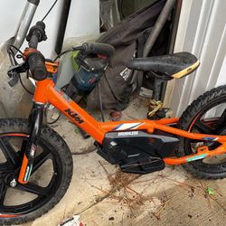 STACYC KTM ELECTRIC KIDS BIKE, Like New