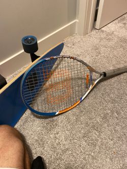 Wilson tennis racket. NEED GONE.