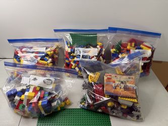 Vintage Legos with figurines  9 pounds worth.