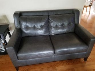 Genuine Leather couch and love seat, and ottoman