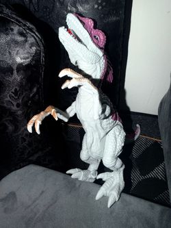 Pink and white dinosaur action figure #dinosaur #toy