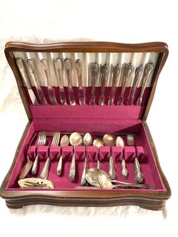 Antique over 100 years old heavy silver plate, serving flatware with wood case. Serves 12.